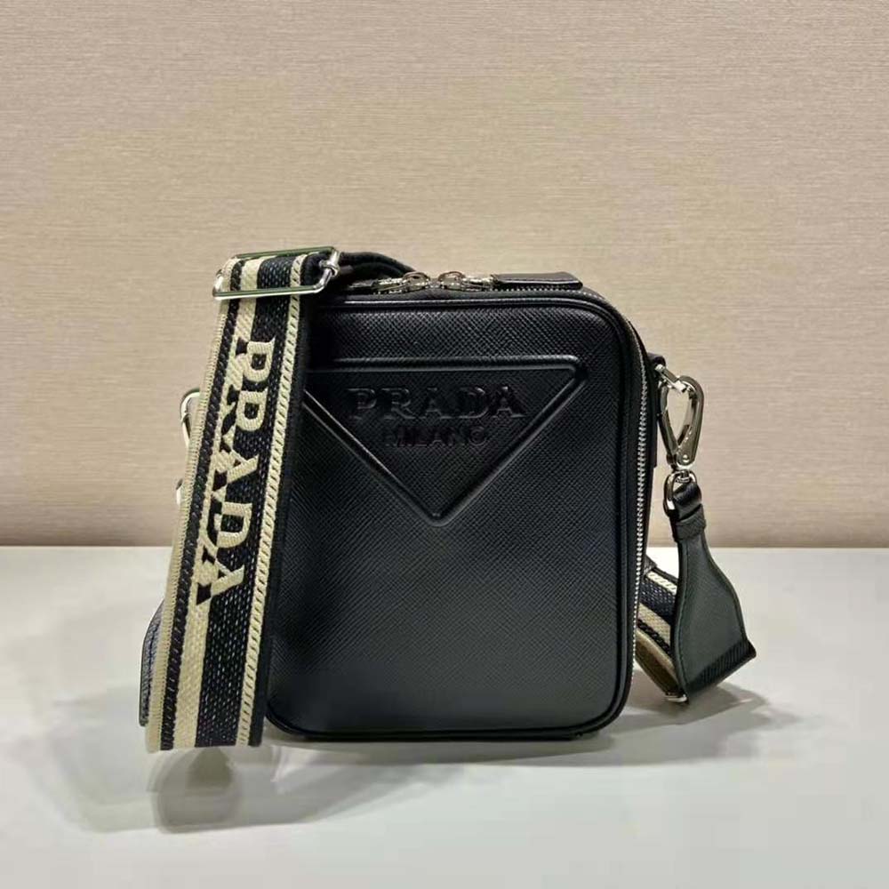 Side angle of Prada Women Saffiano Leather Shoulder Bag-Black with strap visible