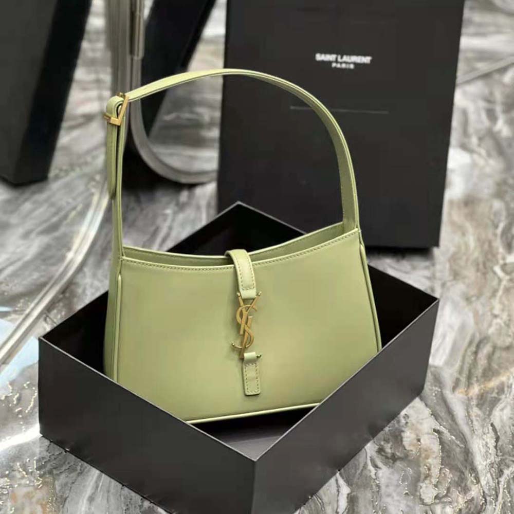 Side angle showing smooth leather texture and hobo silhouette of Saint Laurent bag