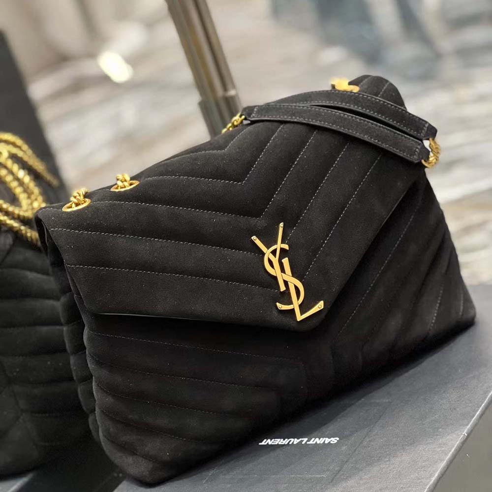 Side angle showing quilted leather and suede detail on Saint Laurent Loulou
