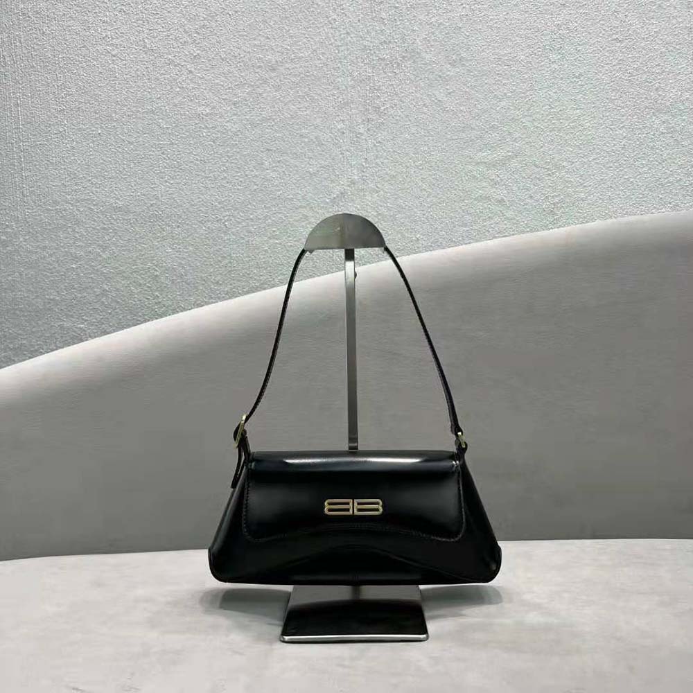 Side angle showing the slim profile of Balenciaga Women XX Small Flap Bag Box in Black