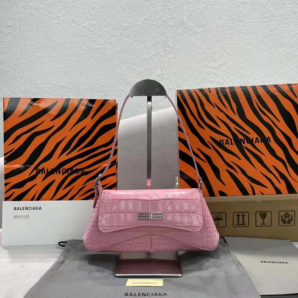 Close-up of crocodile embossed texture on Balenciaga Women XX Small Flap Bag Pink