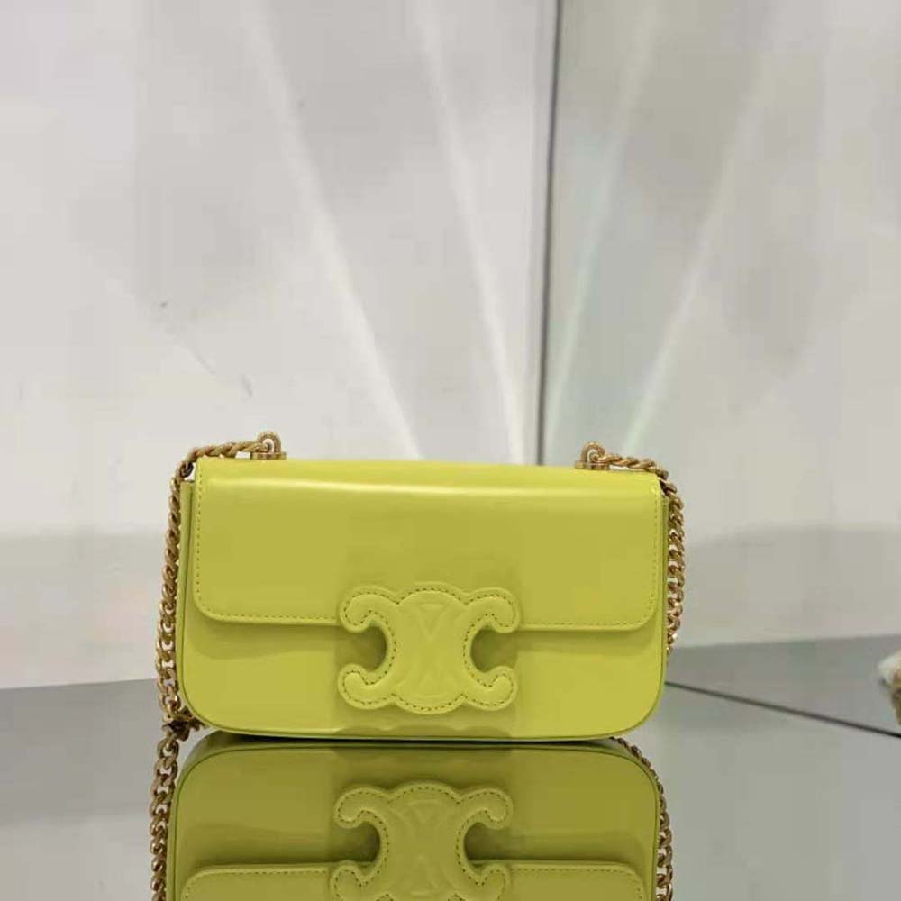 Close-up of gold Triomphe chain detail on Celine shoulder bag