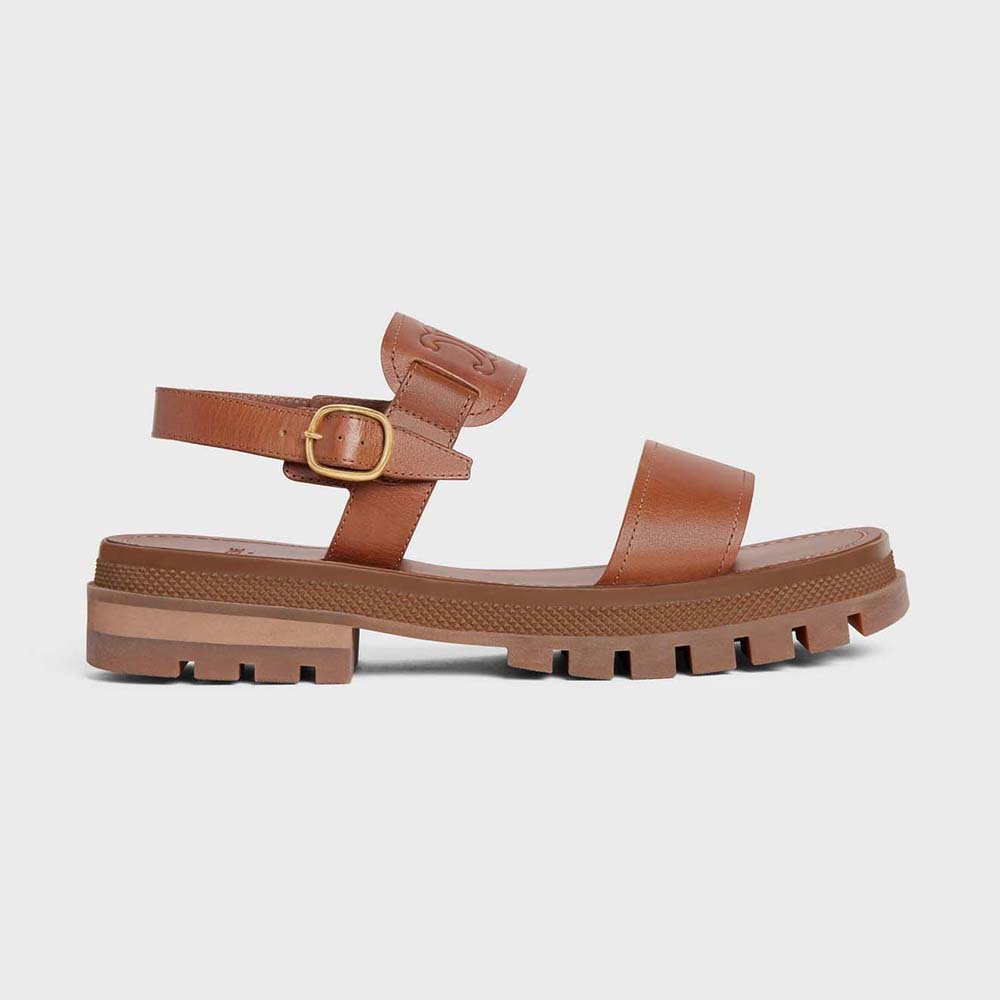 Side view of Celine Women Clea Triomphe Sandal in brown calfskin