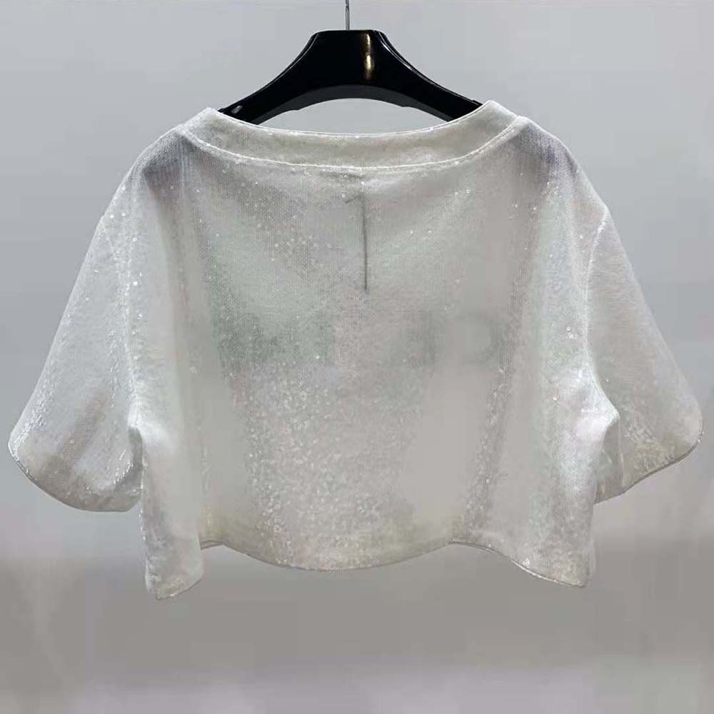 Side angle showing fit and cotton texture of Celine Women Embroidered T-shirt