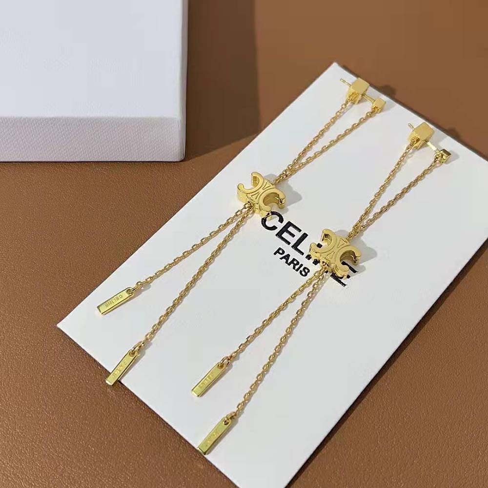 Close-up of gold finish and sliding detail on Celine Women Triomphe Earrings