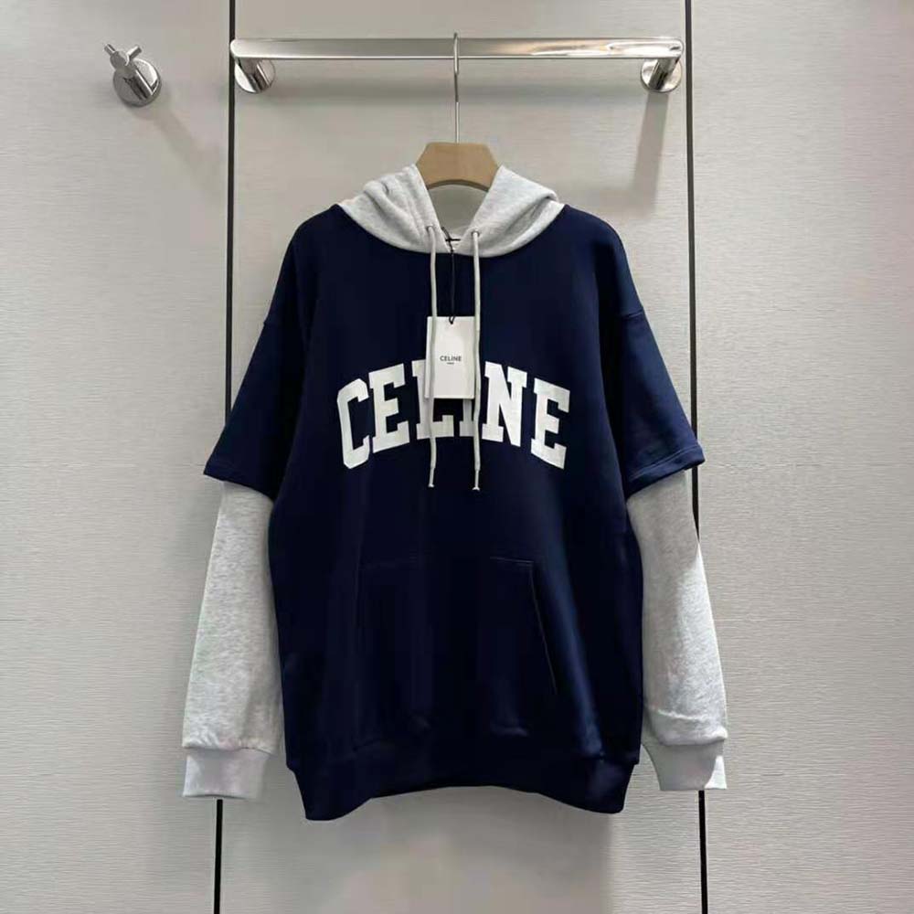 Close-up of two-tone detail and embroidery on navy Celine hoodie