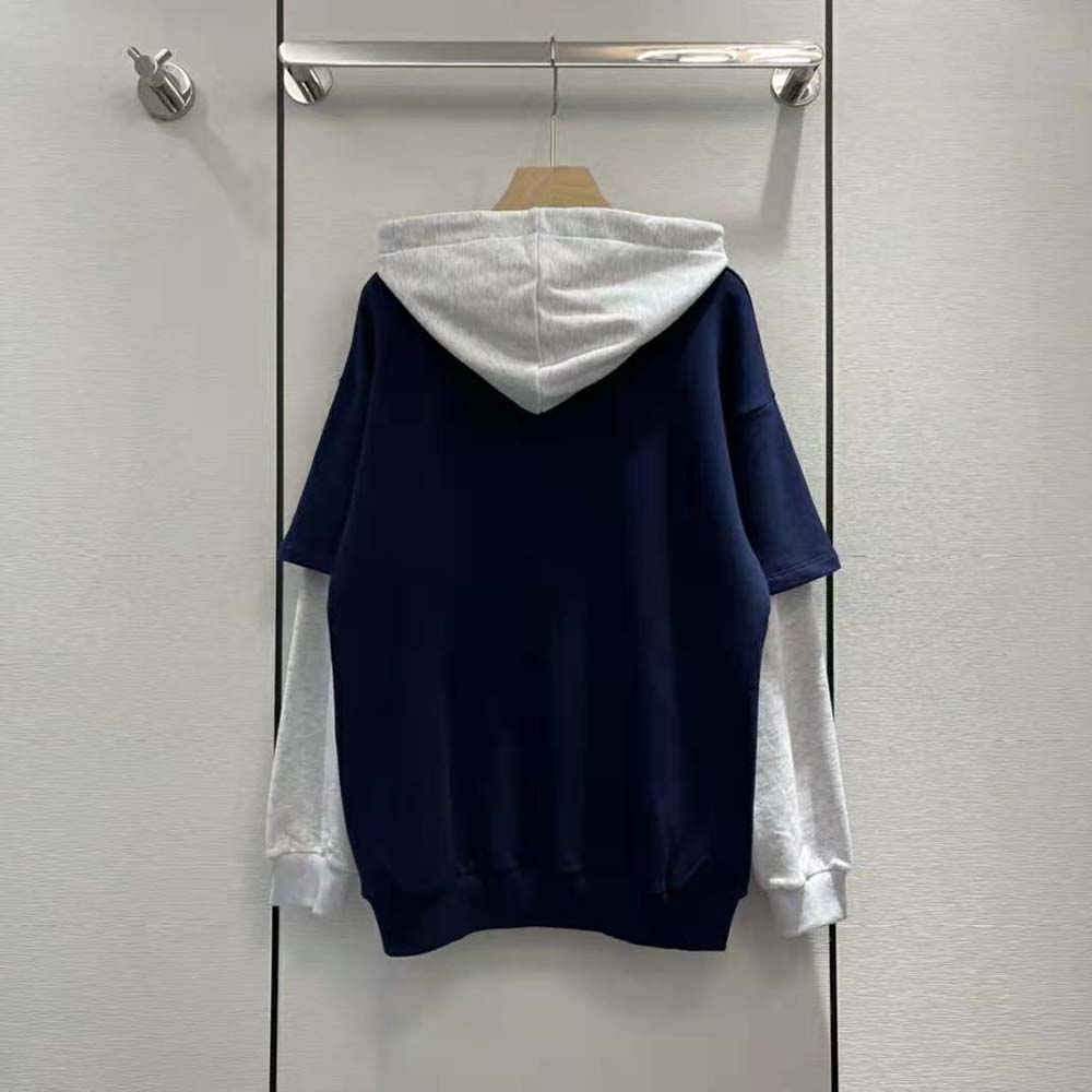 Side profile highlighting fit and cotton fleece texture on Celine hoodie
