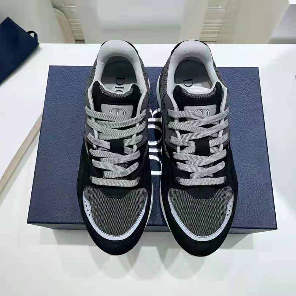 Close-up of silver Dior hardware on B29 Sneaker black calfskin