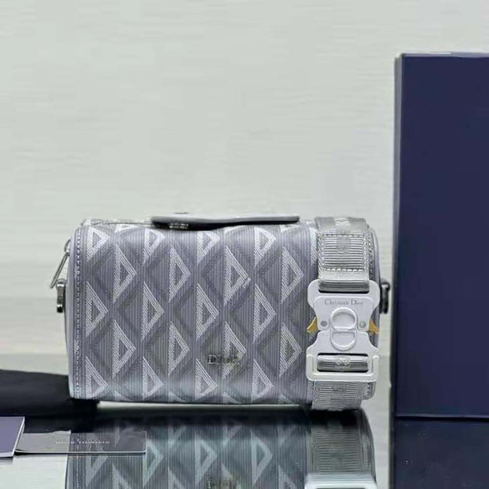 Close-up of gray CD diamond canvas texture on Dior Men Lingot 22 Bag