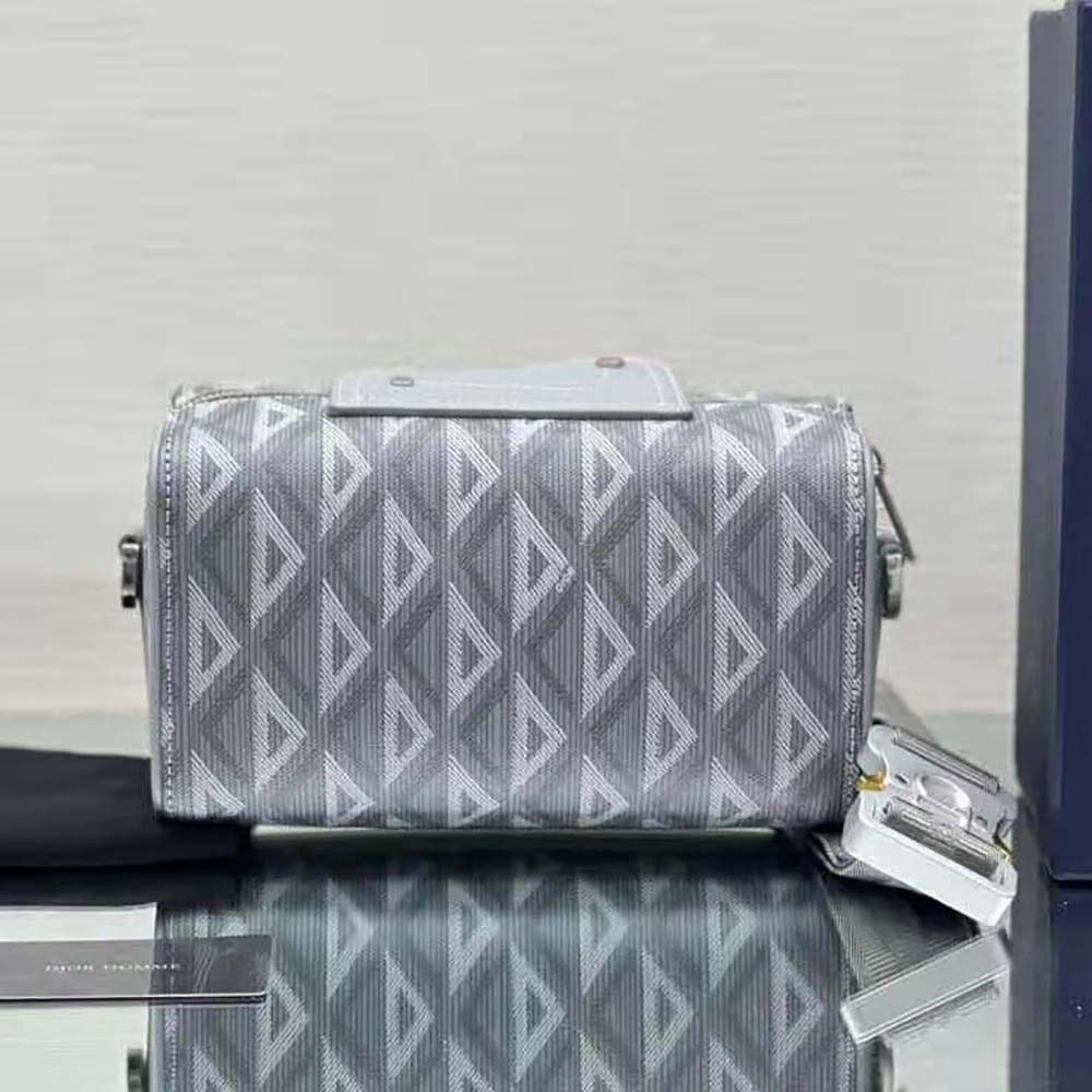 Side angle showing silver hardware and zipper on Dior Men Lingot 22 Bag