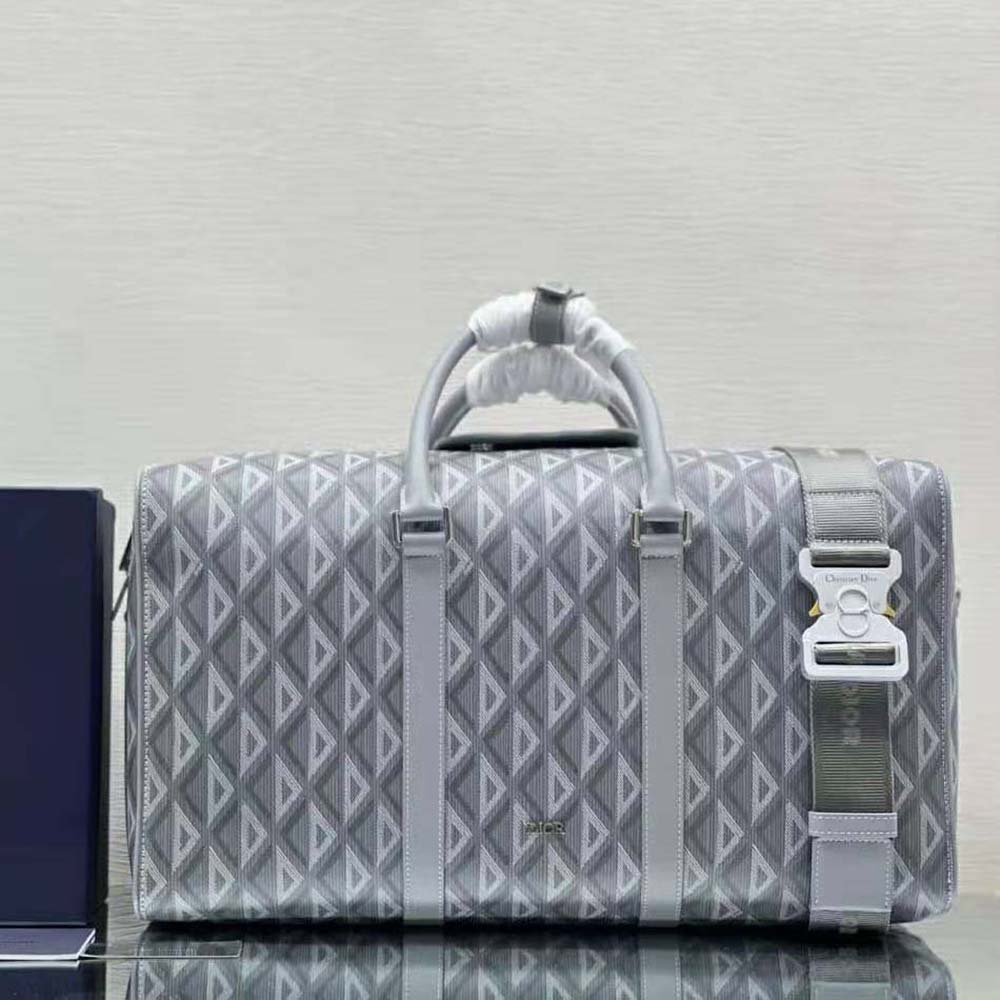 Close-up of silver hardware and signature CD on Dior Men Lingot 50 Duffle Bag