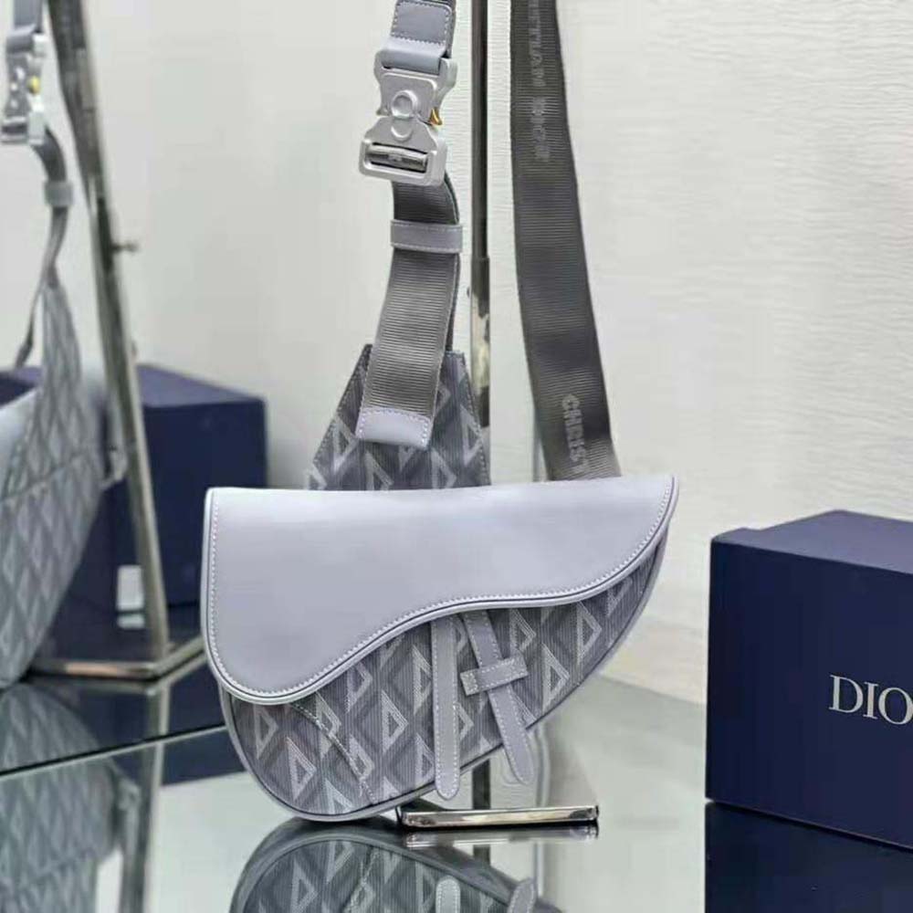 Close-up of silver-tone hardware on Dior Men Mini Saddle Bag Dior Gray