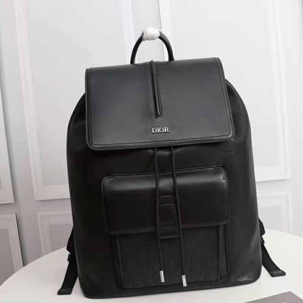 Close-up of silver hardware and smooth calfskin details on backpack