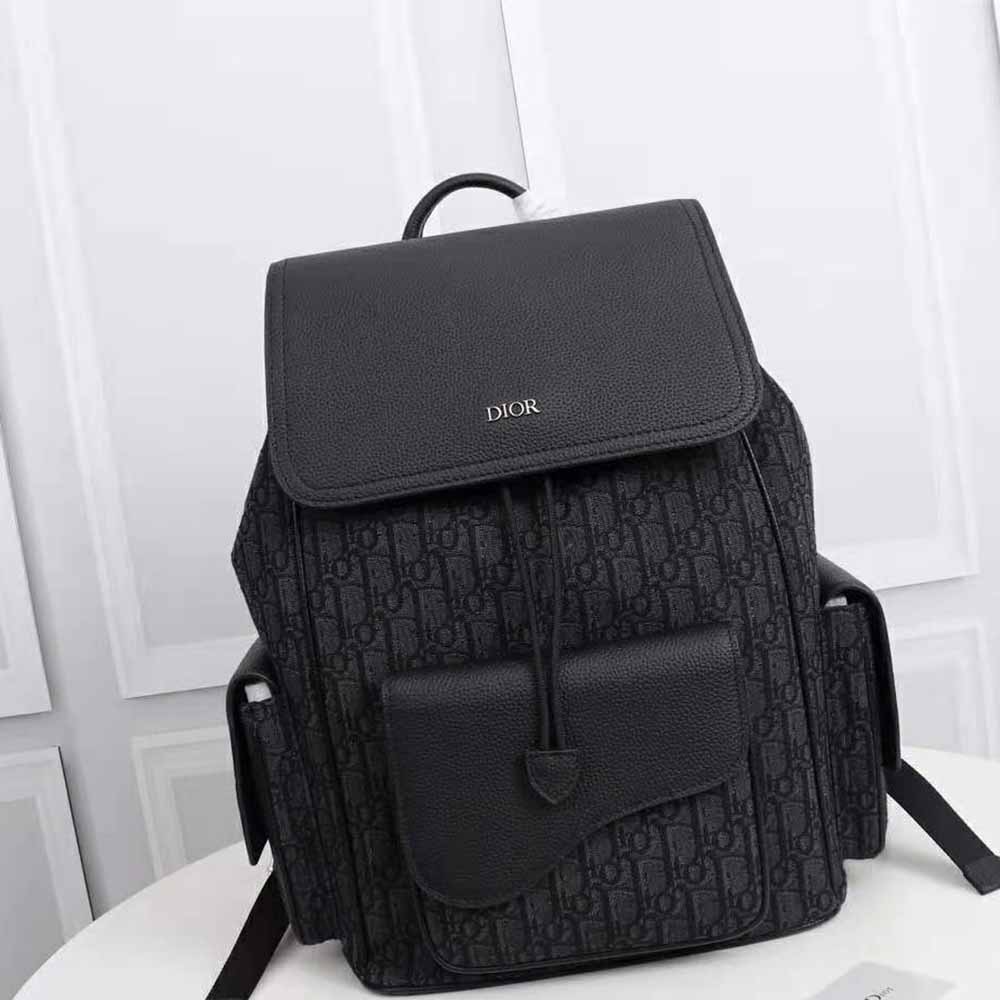 Close-up of black grained calfskin and matte hardware on backpack