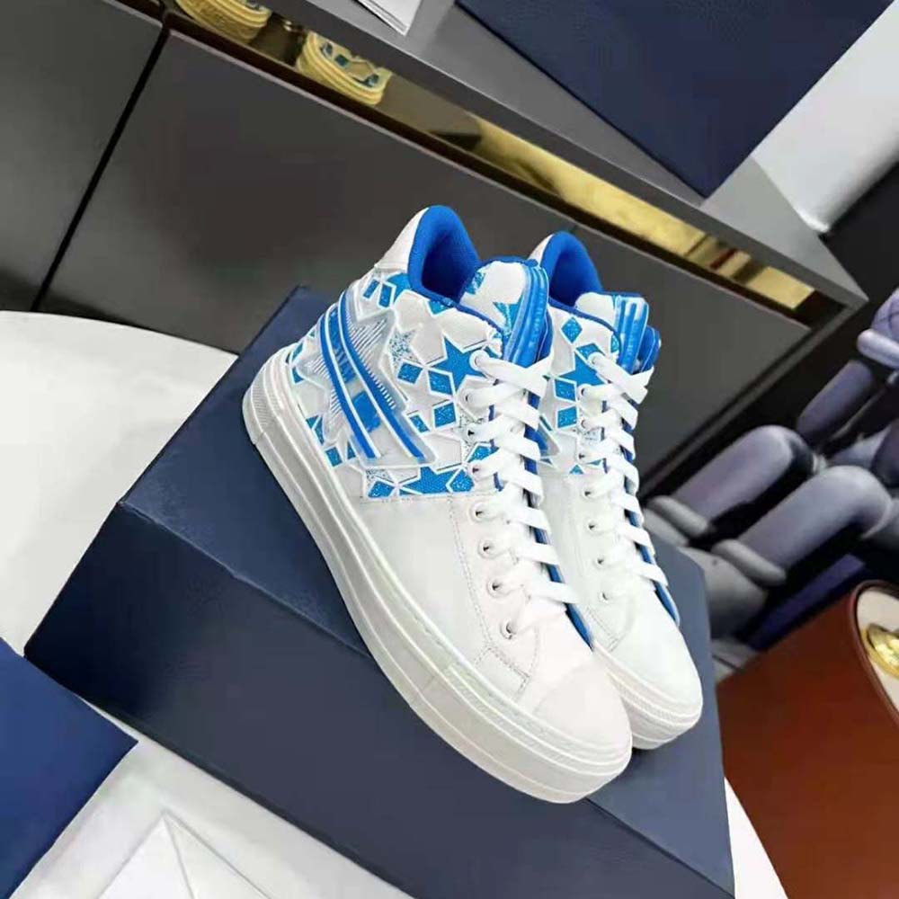 Overhead shot showing vibrant blue and white calfskin sneaker details