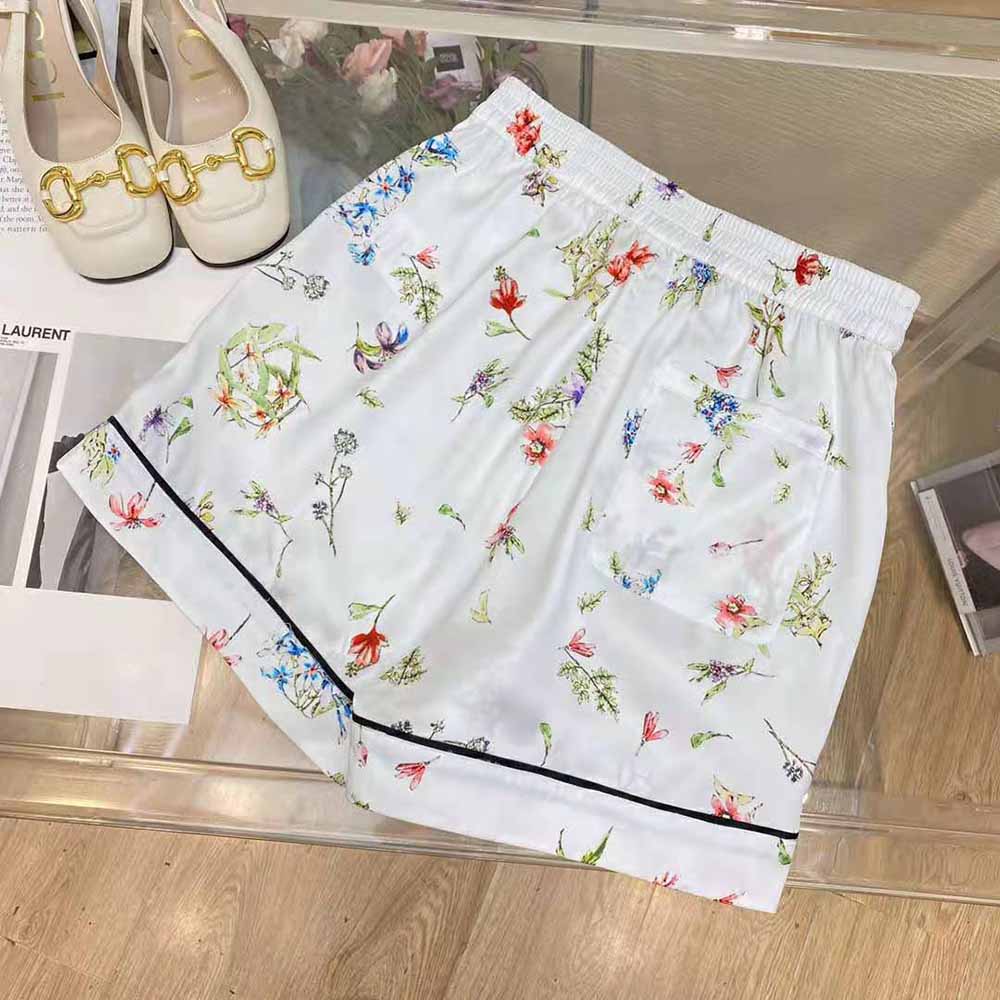 Side angle showing tailored silhouette of Dior Women Chez Moi Shorts White Silk Twill