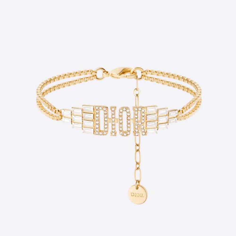 Close-up of Dior Women Dio(r)evolution Bracelet gold finish and crystals