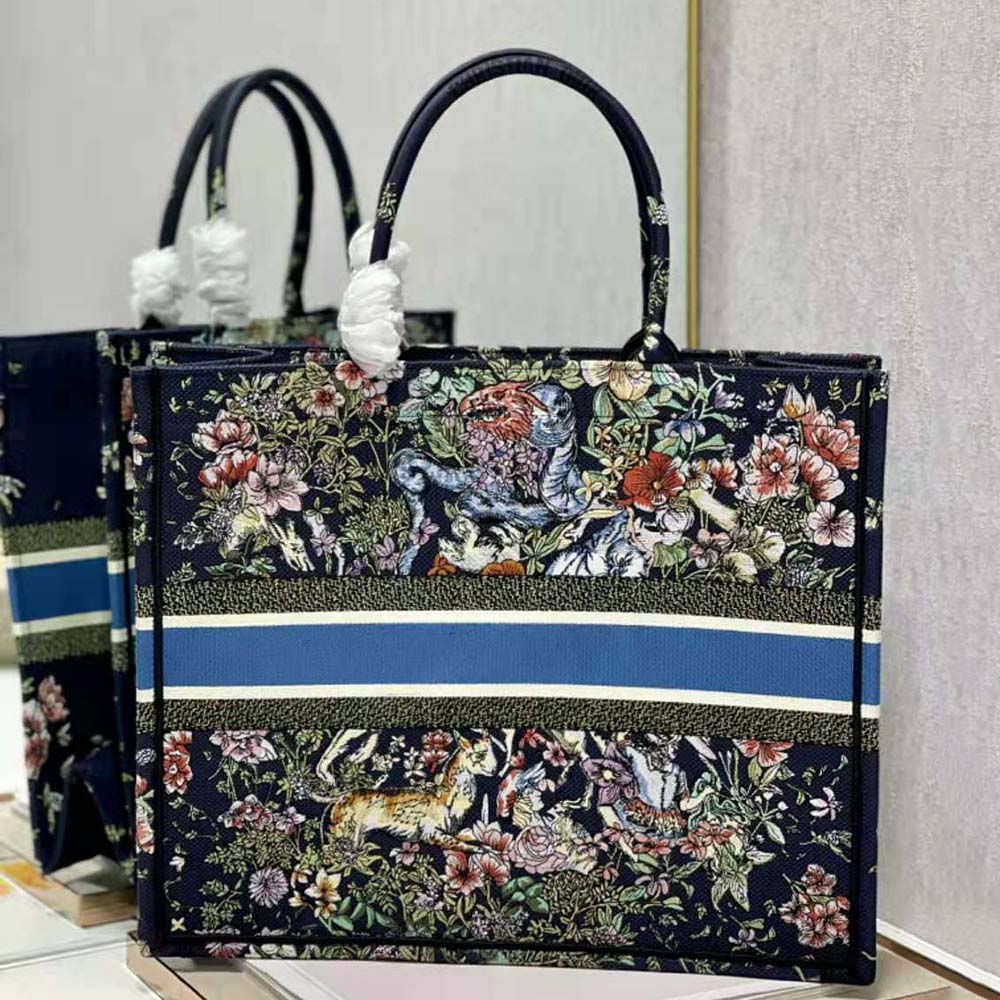 Side angle showing silver-tone hardware on Dior Women Large Dior Book Tote Blue Multicolor