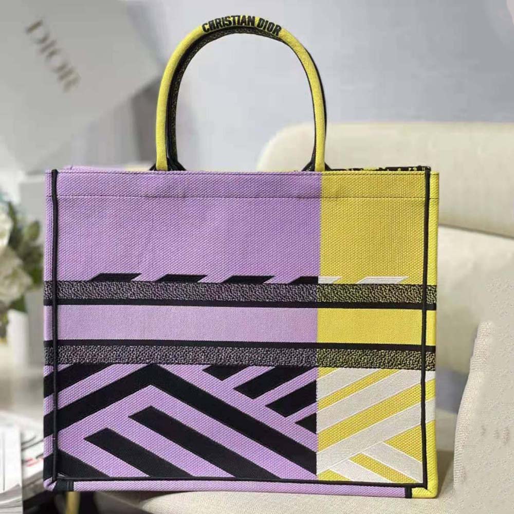 Side angle showing spacious interior of Dior Women Large Dior Book Tote
