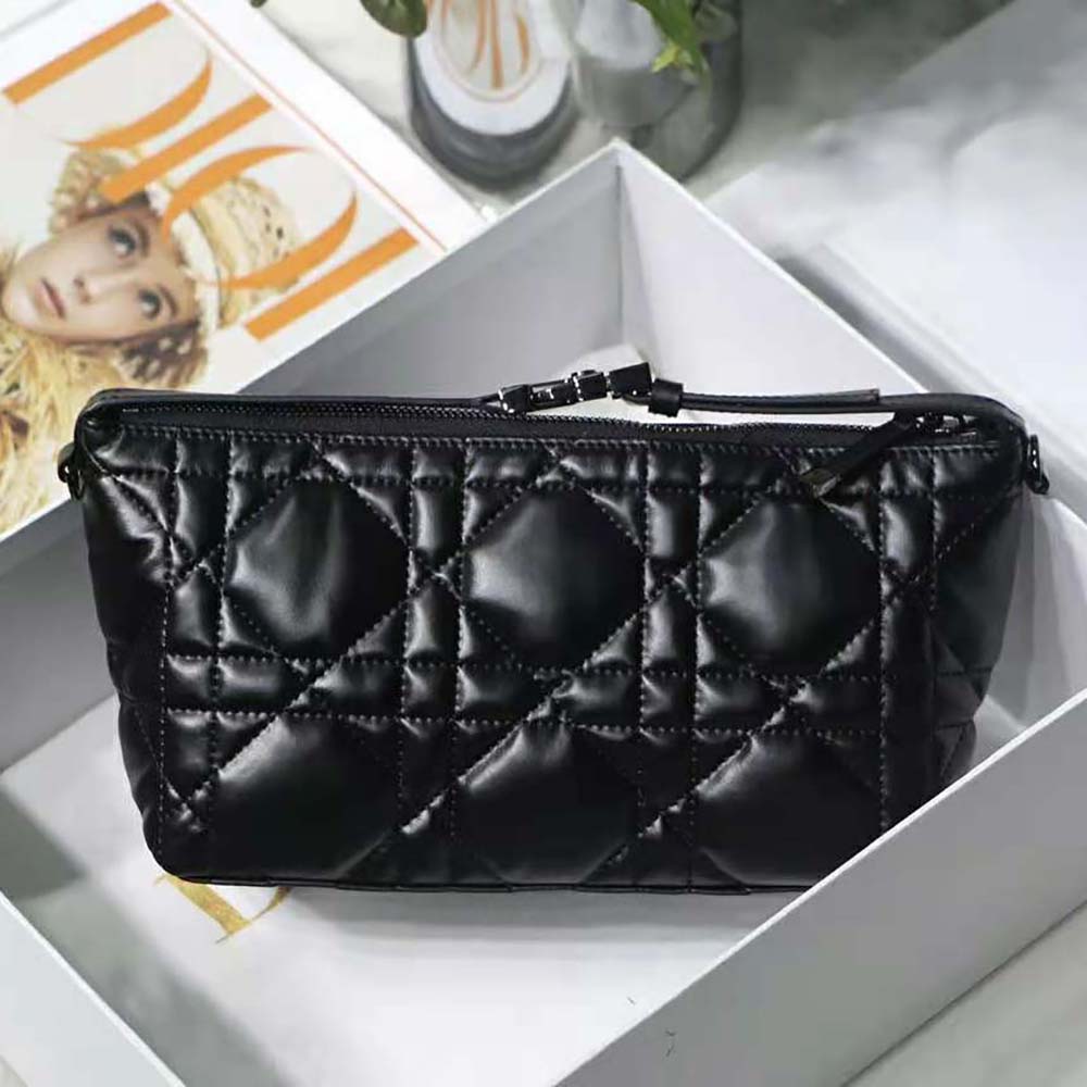 Interior shot showing lining and spaciousness of Dior Medium Nomad Pouch