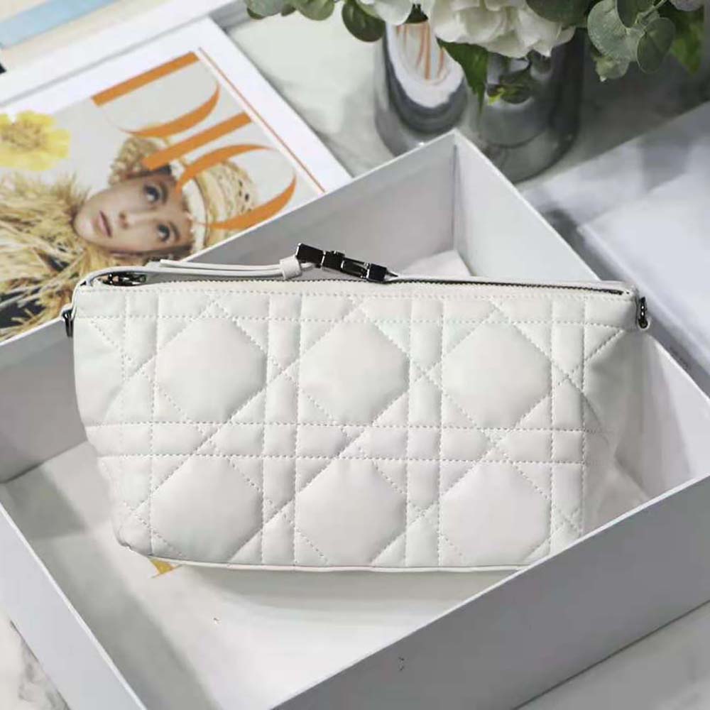 Close-up detail of Macrocannage stitching on Dior travel pouch