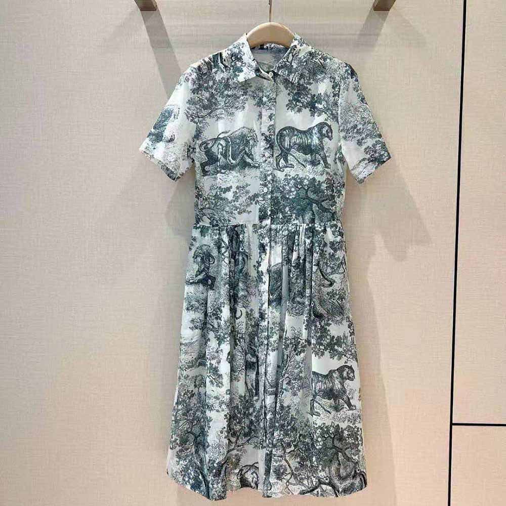 Close-up of navy blue Toile de Jouy print on Dior Women Mid-Length Shirt Dress fabric