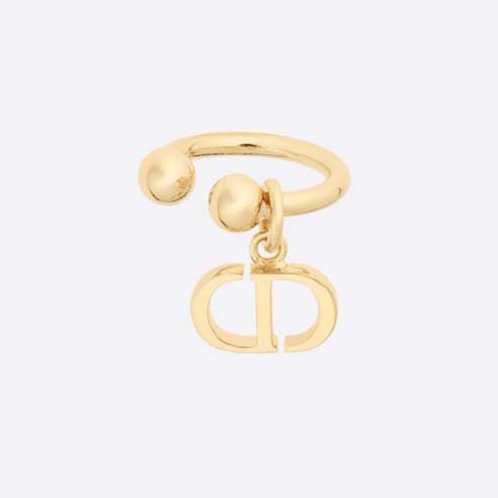 Close-up showing Dior Women Petit CD Ear Jewelry gold finish and detail