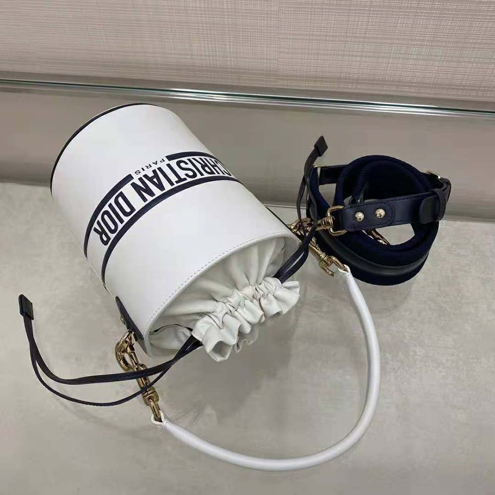 Side profile showing bucket silhouette of Dior Women Small Dior Vibe Bucket Bag