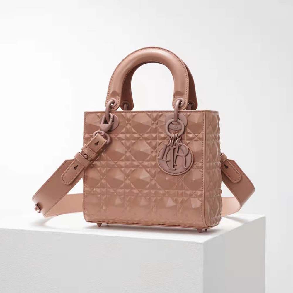 Side profile showing Cannage quilting on Dior Women Small Lady Dior bag