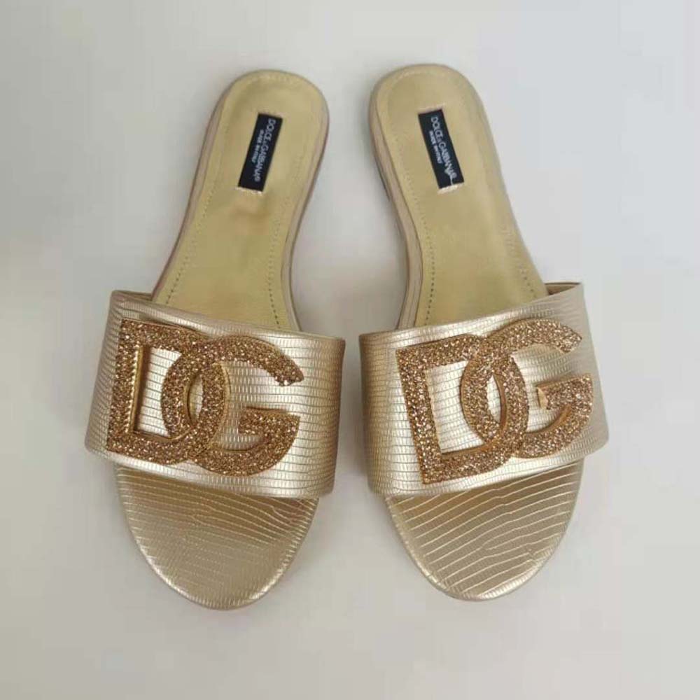 Close-up of rhinestone-detailed DG logo on Dolce Gabbana D&G gold slides