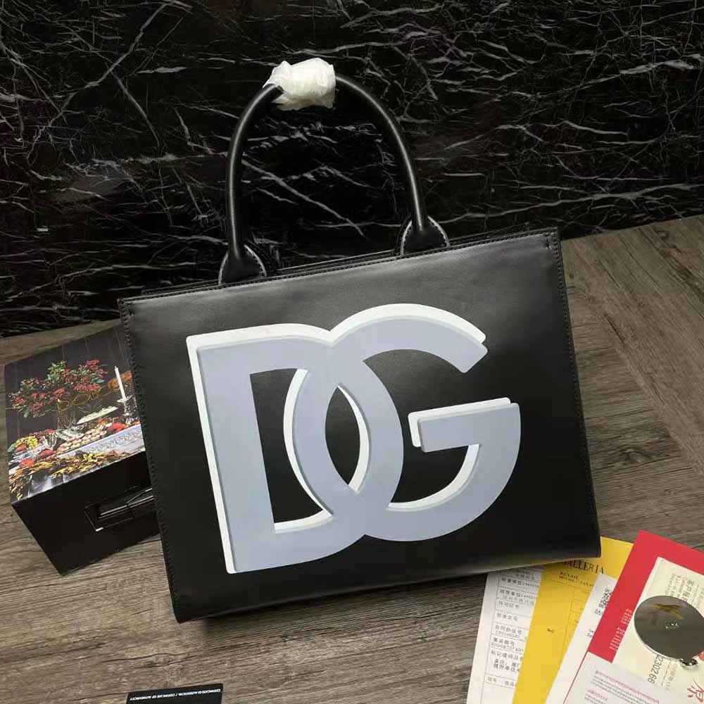 Close-up of glossy gold DG logo detail on DG Daily Shopper