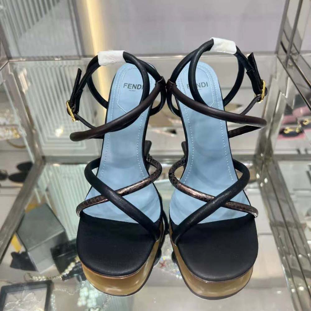 Close-up of gold-tone hardware on Fendi Women First Brown Nappa Leather Sandals
