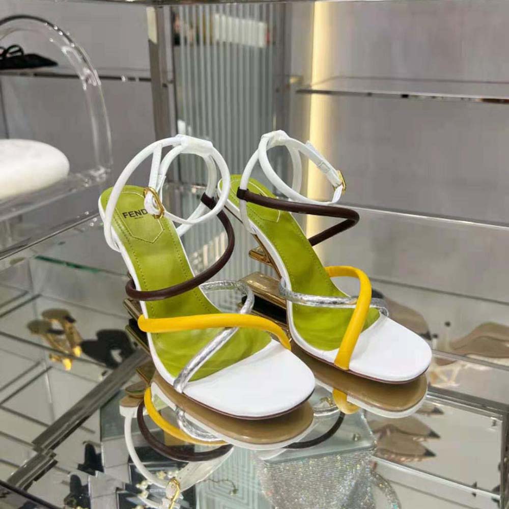 Rear angle showing high heel and ankle strap of Fendi Women First sandals