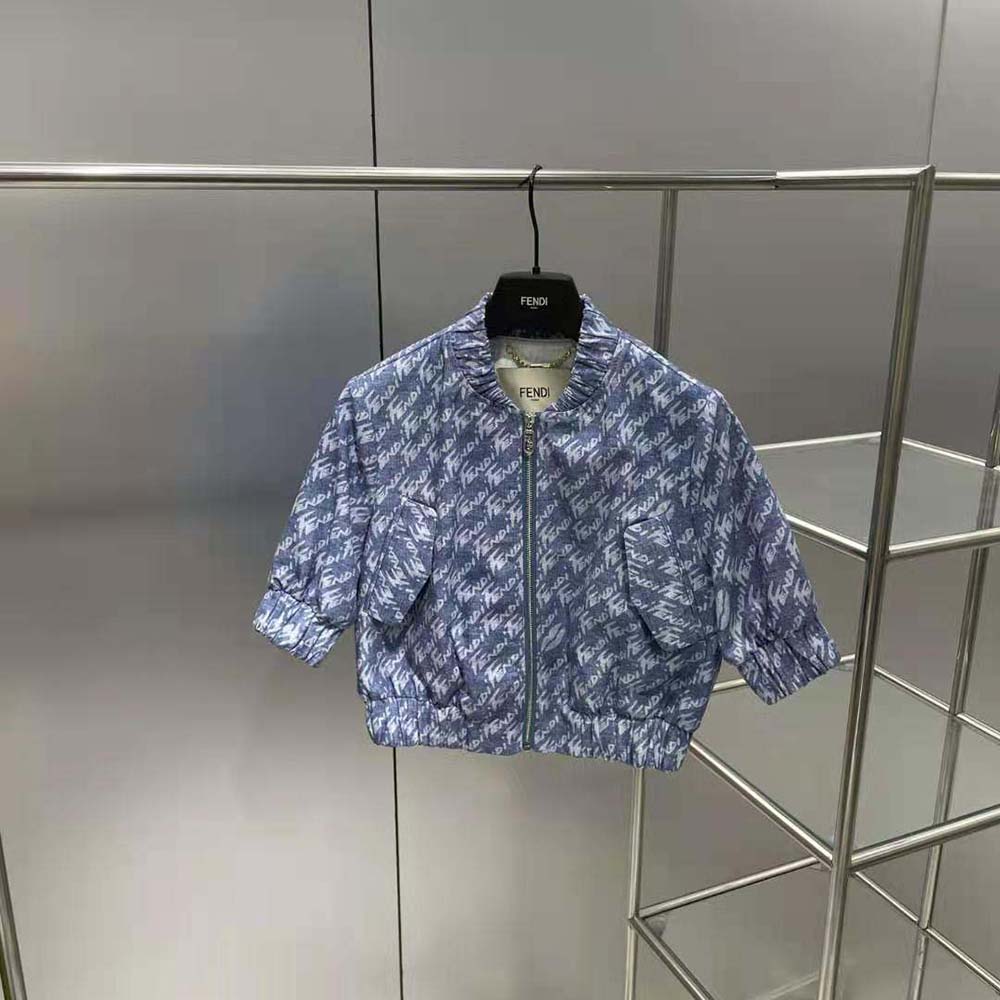 Side angle showing silhouette of Fendi Women Light Blue Chambray Jacket