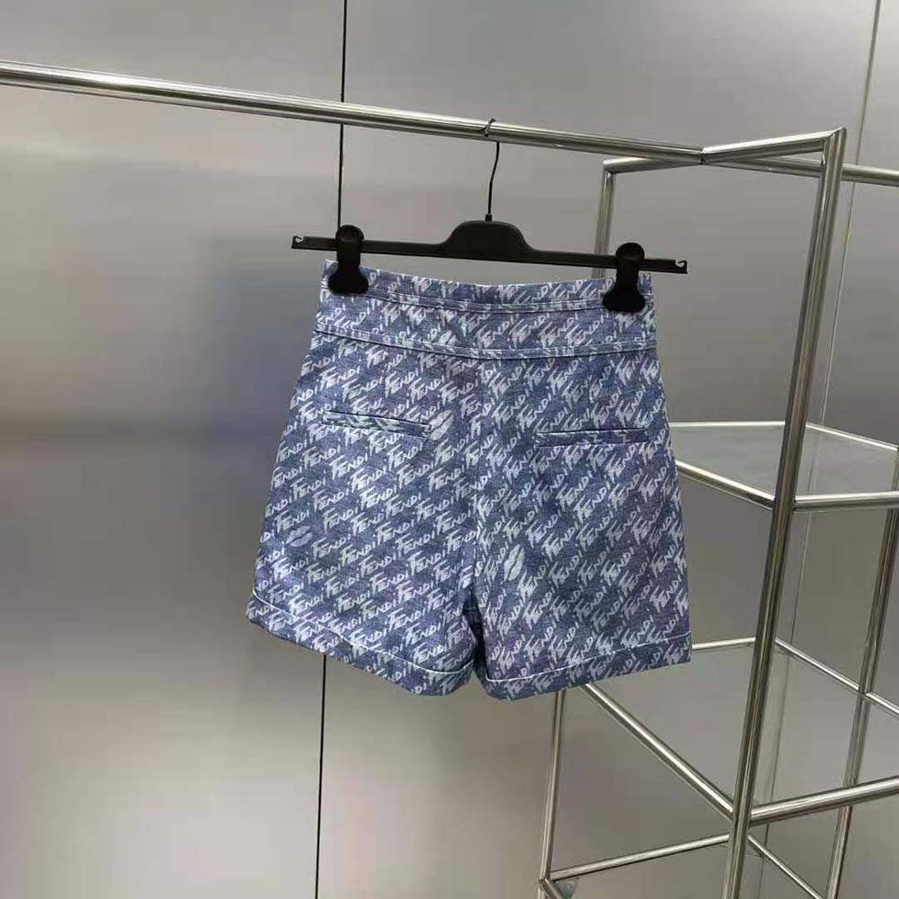Side angle of Fendi Women Light Blue Chambray Shorts highlighting fabric texture