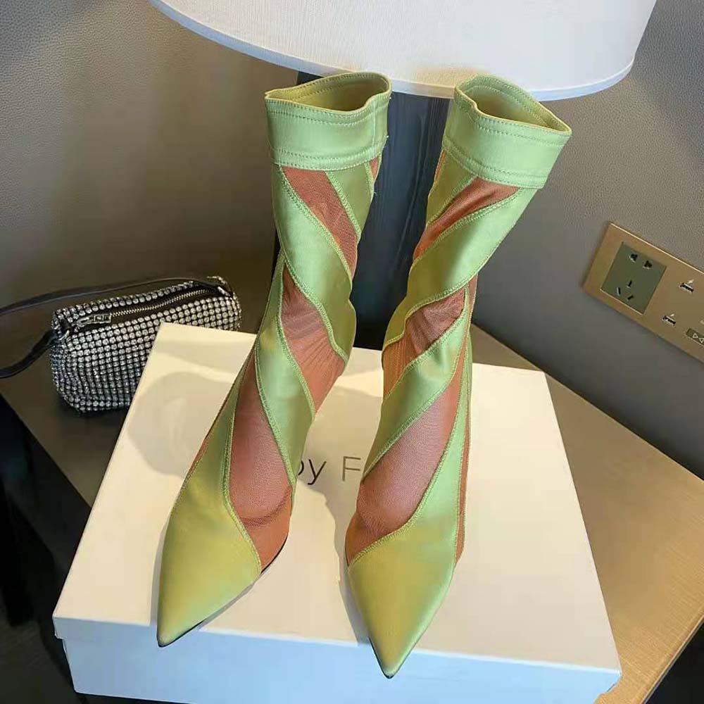 Close-up on spiral stretch fabric texture of Jimmy Choo Women Mugler Sock Ankle Boot