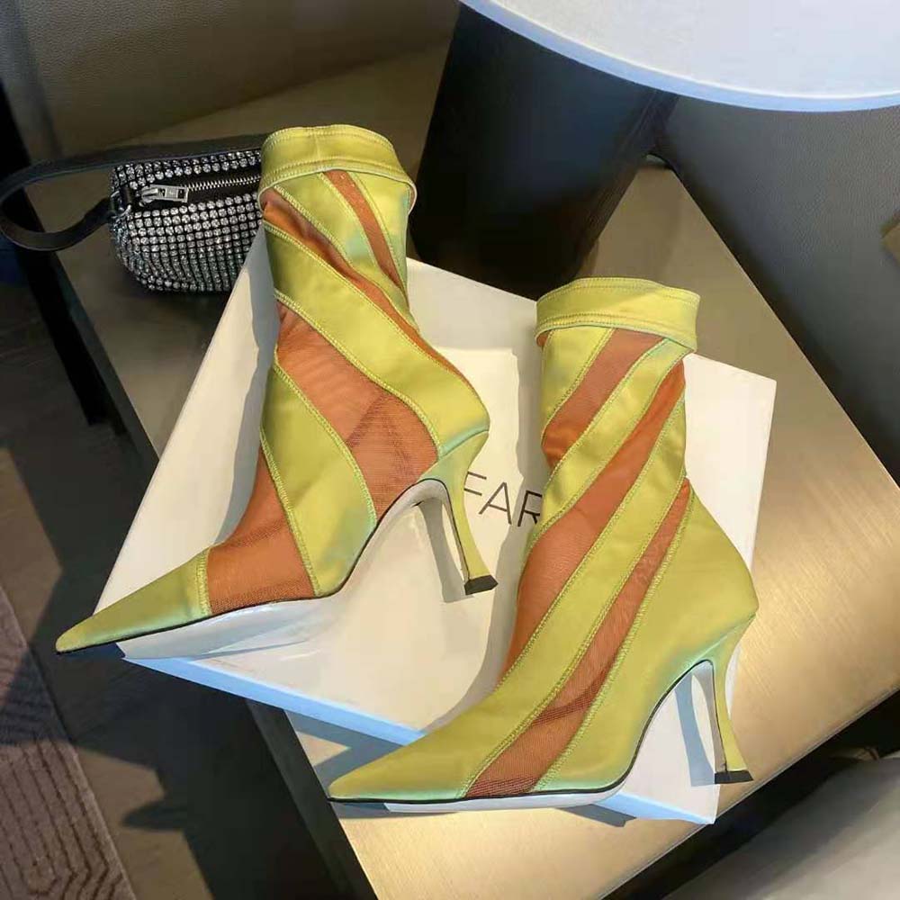 Back view highlighting ankle fit of Jimmy Choo Women Mugler Sock Ankle Boot Neon Yellow