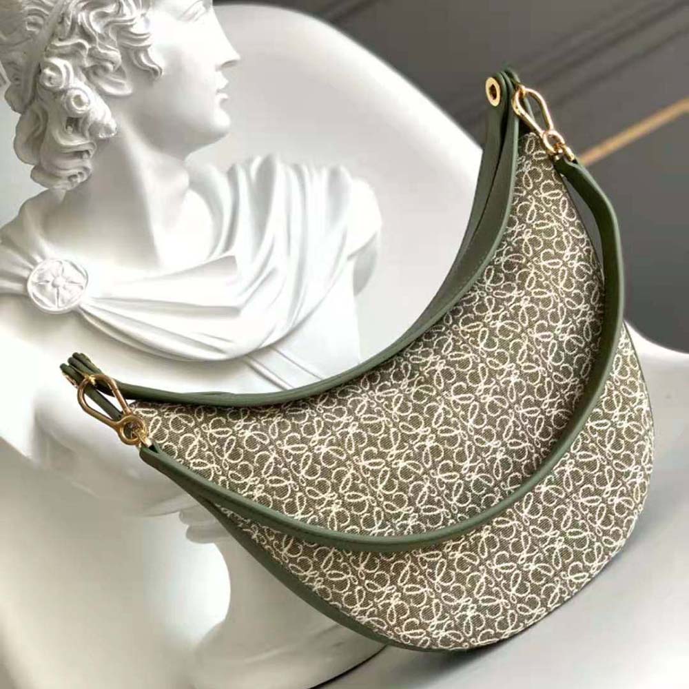 Side angle showing silhouette and adjustable strap of Loewe Women Luna Bag