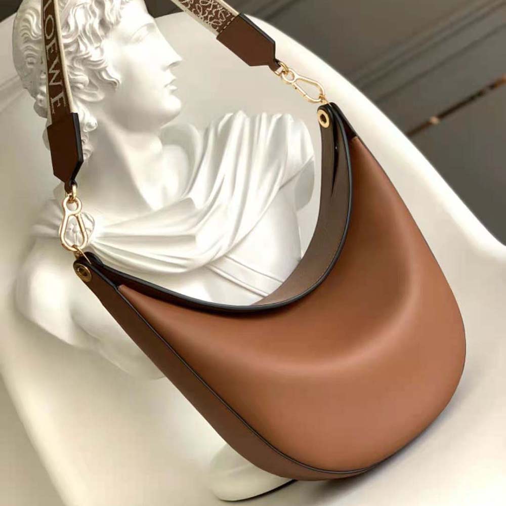 Overhead view showing jacquard fabric detail on Loewe Women Luna Bag