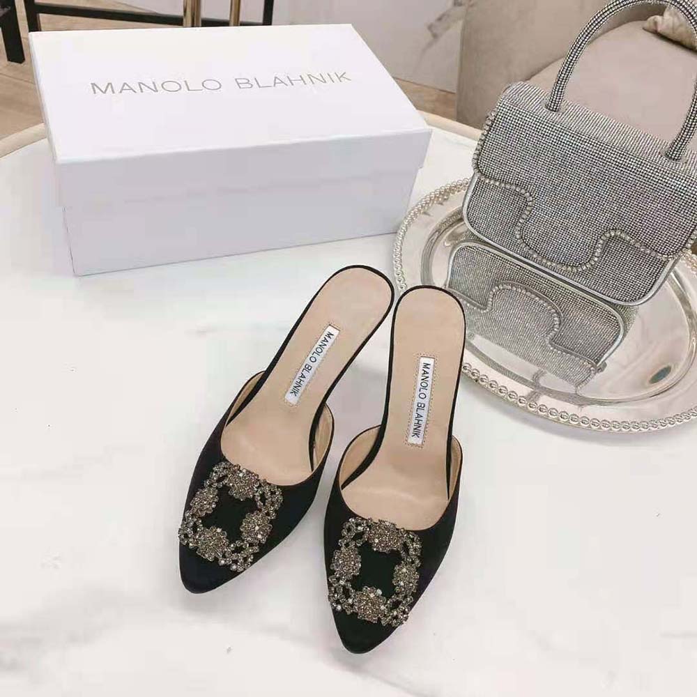 Close-up of sparkling jewel buckle on Manolo Blahnik Women Black Satin Mules