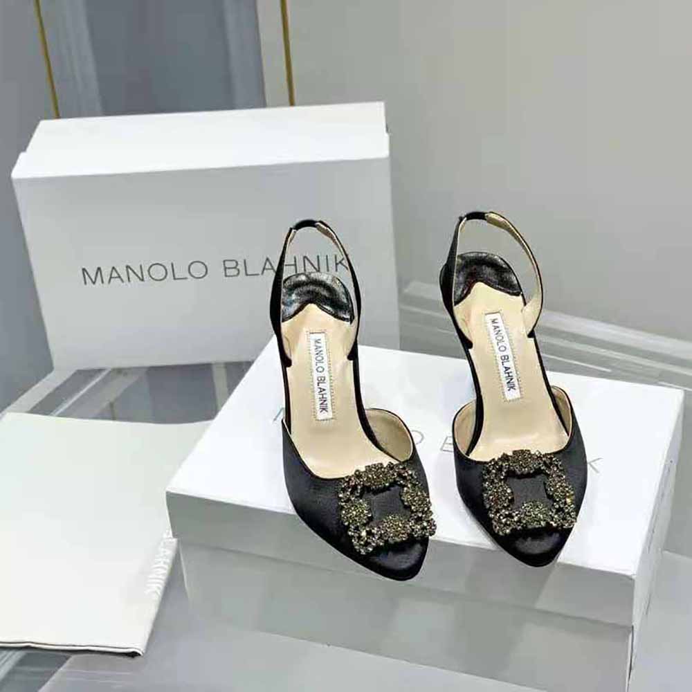 Close-up of jewel buckle detail on Manolo Blahnik satin slingbacks