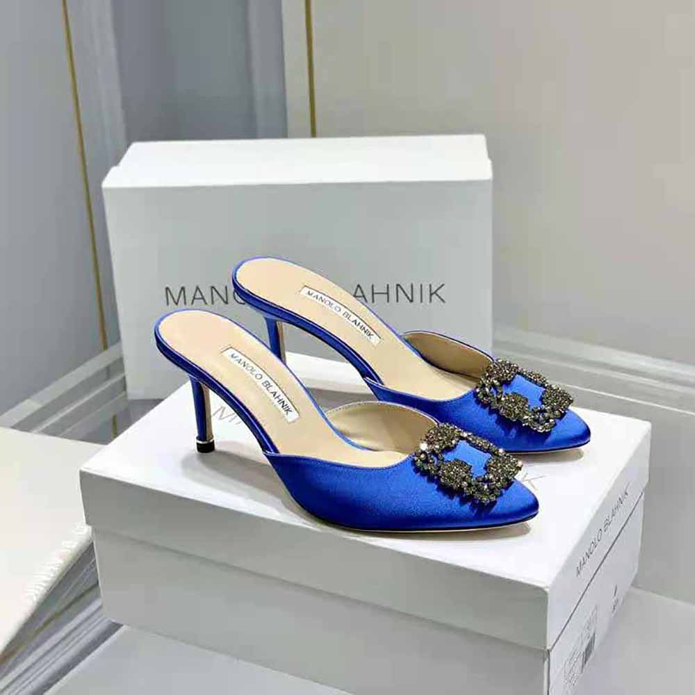 Close-up of jewel buckle detail on Manolo Blahnik mules