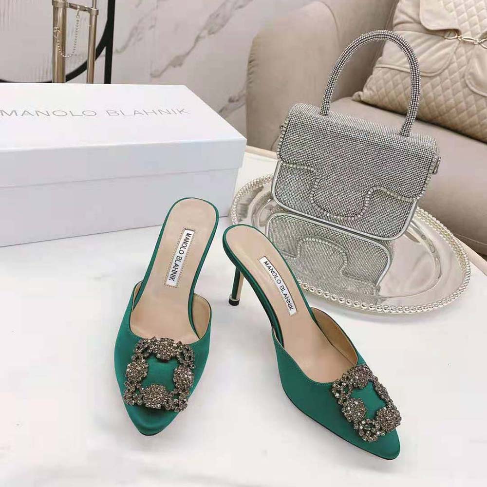 Close-up on jewel buckle detail on Manolo Blahnik Green Satin Mules