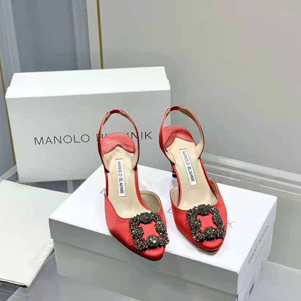 Close-up of jeweled buckle detail on Manolo Blahnik Red Satin Pumps