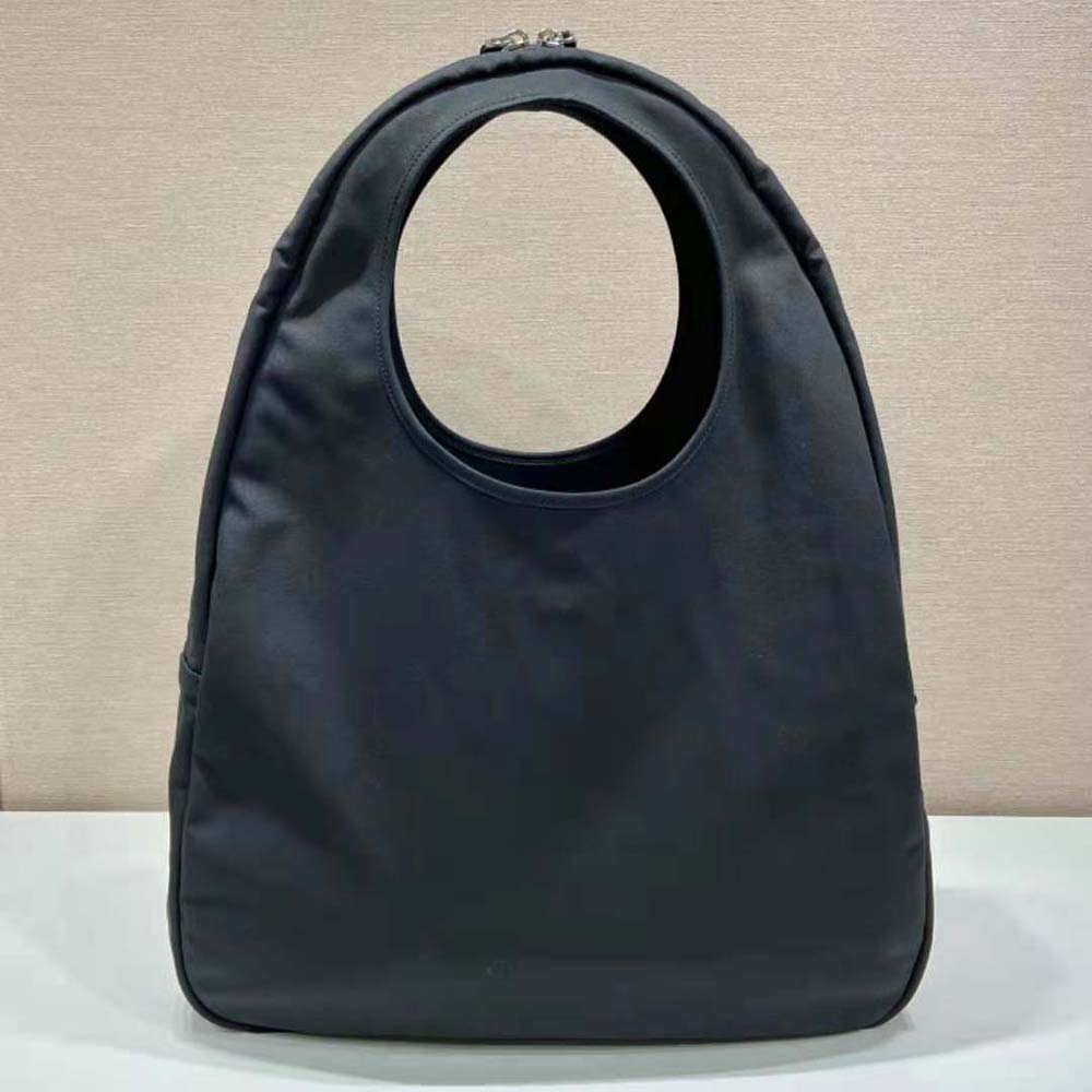 Side profile showing spacious hobo silhouette of Prada Men Canvas Hobo Bag Black