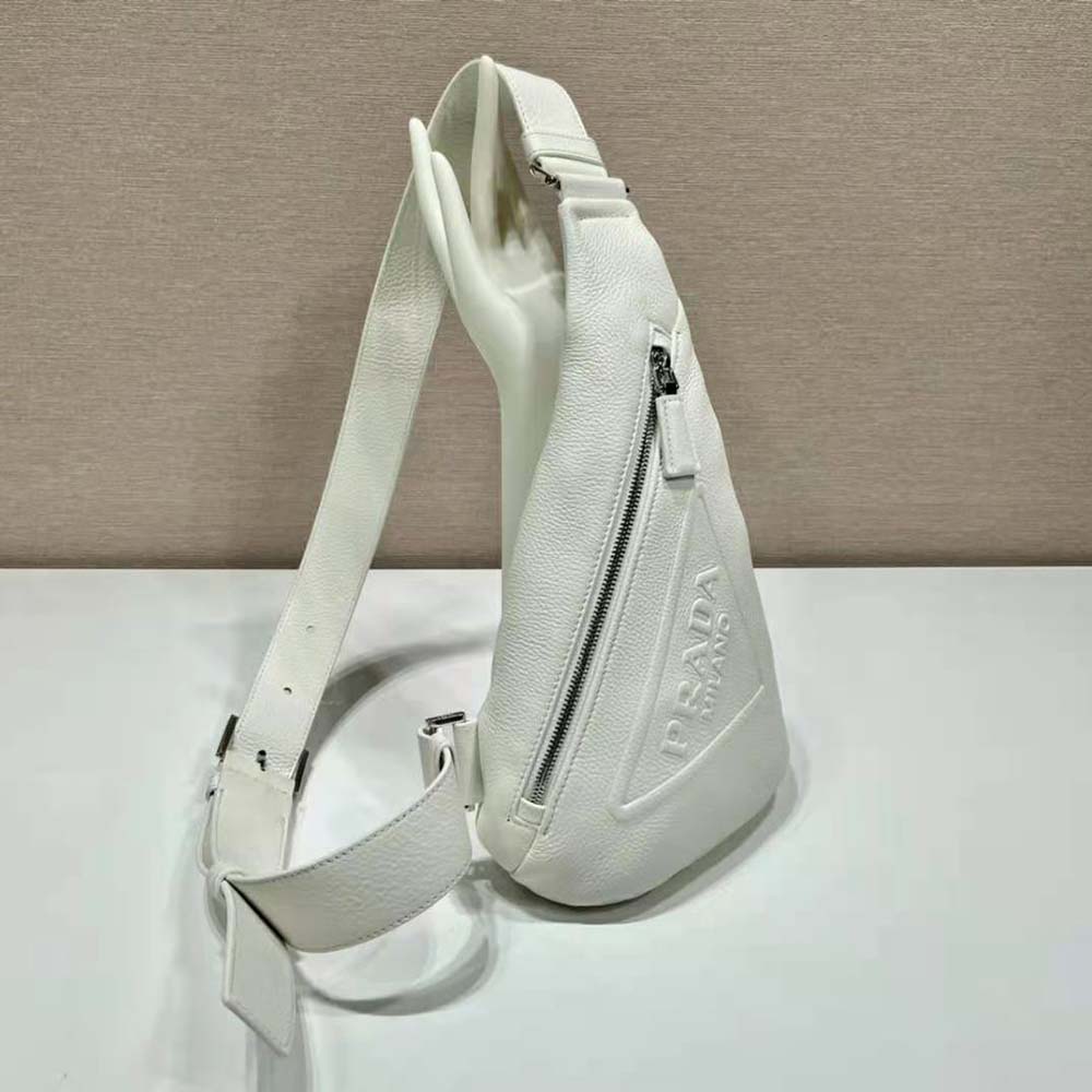 Side angle showing silver hardware and adjustable strap of Prada crossbody bag