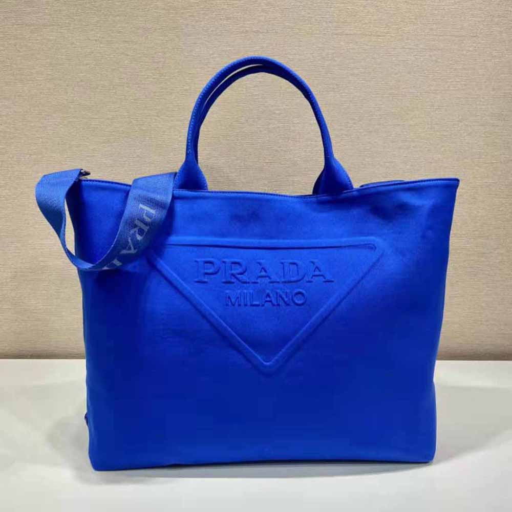 Close-up of polished silver-tone hardware on Prada Women Canvas Tote Bag Navy