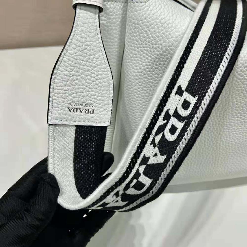 Prada Women Large Leather Handbag with the Prada Metal Lettering Logo Gleaming at Its Center-White - image 9