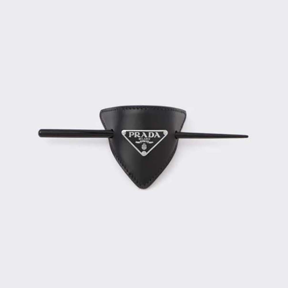 Close-up of Prada Women Leather Hair Clip showing embossed logo
