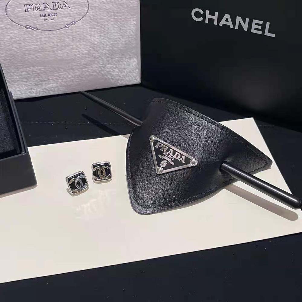 Prada Women Leather Hair Clip styled in model's sleek ponytail